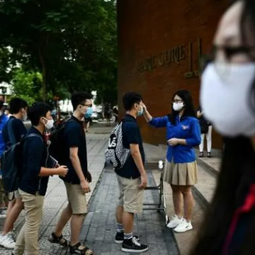 Vietnam students back to school after 3-month | AFP